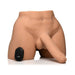 Realistic male torso masturbator with poseable dildo and wireless remote control on white background.