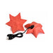 Rose-colored star-shaped vibrator with textured surface and USB charging cable on white background.