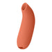 Dame Aer Air Pulse Stimulator in terracotta color with smooth, curved design and air pulse opening.