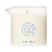 Dame Massage Oil Candle in clear glass container with easy-pour spout and minimalist blue logo, 5 oz size.