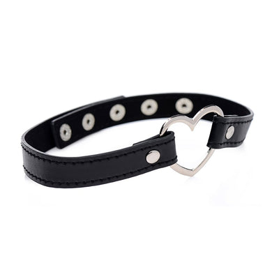 Black vegan leather choker with a silver metal heart centerpiece and adjustable snap closures on a white background.