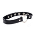 Black vegan leather choker with a silver metal heart centerpiece and adjustable snap closures on a white background.