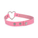 Pink vegan leather choker with a silver heart-shaped metal centerpiece and adjustable snap closures.