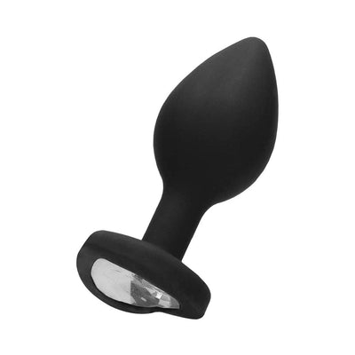Large black silicone butt plug with a tapered shape and a clear diamond-shaped gem at the base.