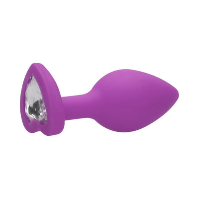 Purple silicone butt plug with a heart-shaped base featuring a clear diamond detail.