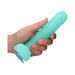 Hand holding a light blue glow-in-the-dark novelty soap shaped with textured details and a suction base.