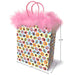 Colorful patterned gift bag with pink marabou trim and woven handles, measuring 10.75 by 7.75 by 4 inches.
