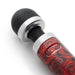 Close-up of Doxy Die Cast 3R wand massager with black head and red rose pattern handle.