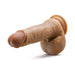 Realistic 7.25-inch dildo with suction cup base and detailed texture in natural skin tone.