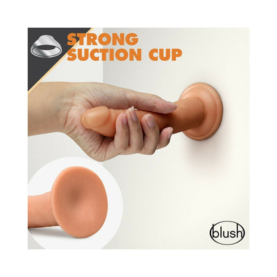 Hand holding a 7.5-inch realistic dildo with a strong suction cup base attached to a wall for hands-free use.