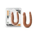Dr. Skin Mini Double Dong in brown with U-shape design, soft realistic texture, shown in packaging and outside.