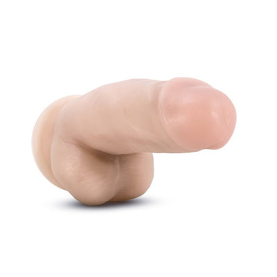 Realistic 7-inch flesh-toned poseable dildo with balls and suction cup base on white background.