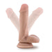 Realistic 6-inch posable dildo with balls and suction cup base in natural skin tone shown in adjustable positions.