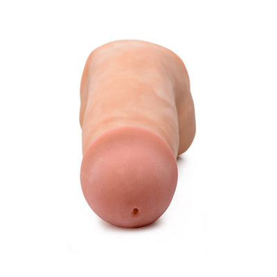Beige dual density squirting dildo with realistic texture and lifelike tip, shown from the front on white background.