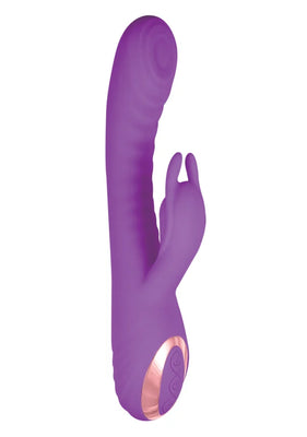 Purple silicone dual-stimulation vibrator with textured shaft and ergonomic controls on the base.