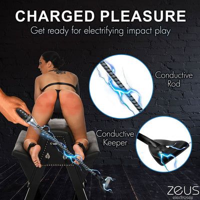 E-stim crop with conductive rod and vegan leather tip shown in use on a person bent over a padded bench, highlighting electrifying impact play features.