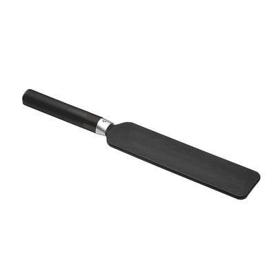 Black e-stim paddle with smooth vegan leather side and black handle with silver accent on white background.