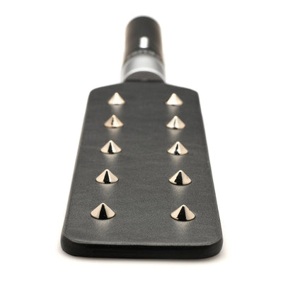 Black vegan leather paddle with two rows of metal spikes and a handle, designed for e-stim play.