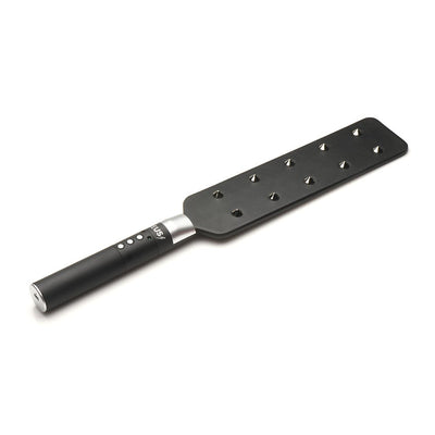 Black e-stim paddle with ten metal spikes on one side and control buttons on the handle, designed for sensation play.