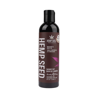 Bottle of Earthly Body Hemp Seed Massage and Body Oil, 8 oz, with dark label and purple leaf design.