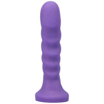Midnight purple silicone vibrator with textured shaft and flared base for g-spot stimulation and pelvic floor exercises.