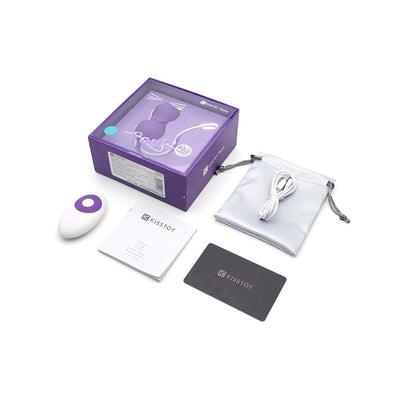 Emojibator Paula Kitty Cat Kegel Ball Vibrator with remote, USB charging cable, storage pouch, and user manual in purple packaging.