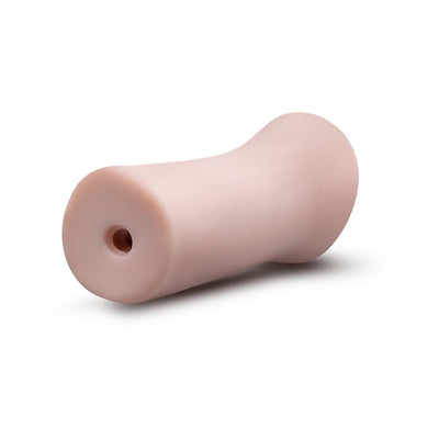 Beige soft male stroker with a smooth, contoured design and open-ended canal for enhanced comfort and pleasure.