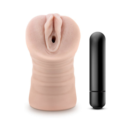 Beige EnLust Ayumi vibrating stroker with realistic texture and black removable bullet vibrator on white background.
