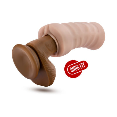 Beige EnLust Destini vibrating stroker on brown model with snug fit label on white background.