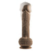 Dark skin tone realistic silicone dildo with suction base showing thrusting motion effect on white background.