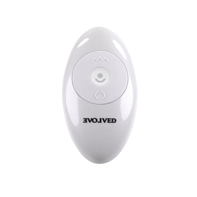 White oval-shaped remote control with Evolved logo and three control buttons for vibrating dildo functions