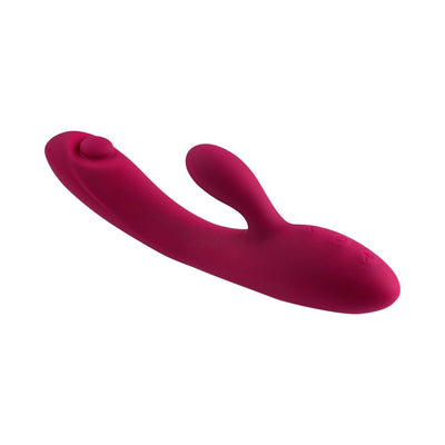 Sleek deep pink silicone rabbit vibrator with curved shaft and flexible clitoral stimulator, featuring ergonomic control buttons.