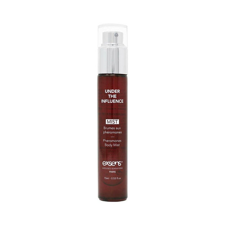 EXSENS of Paris Under the Influence pheromone body mist in a sleek 15 ml dark amber spray bottle with silver cap.