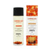 EXSENS Carnelian Apricot organic massage oil bottle with embedded carnelian stones and matching orange-accented box packaging.