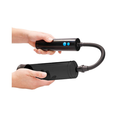 Hands holding a clear rechargeable automatic vacuum pump with flexible hose and control buttons.