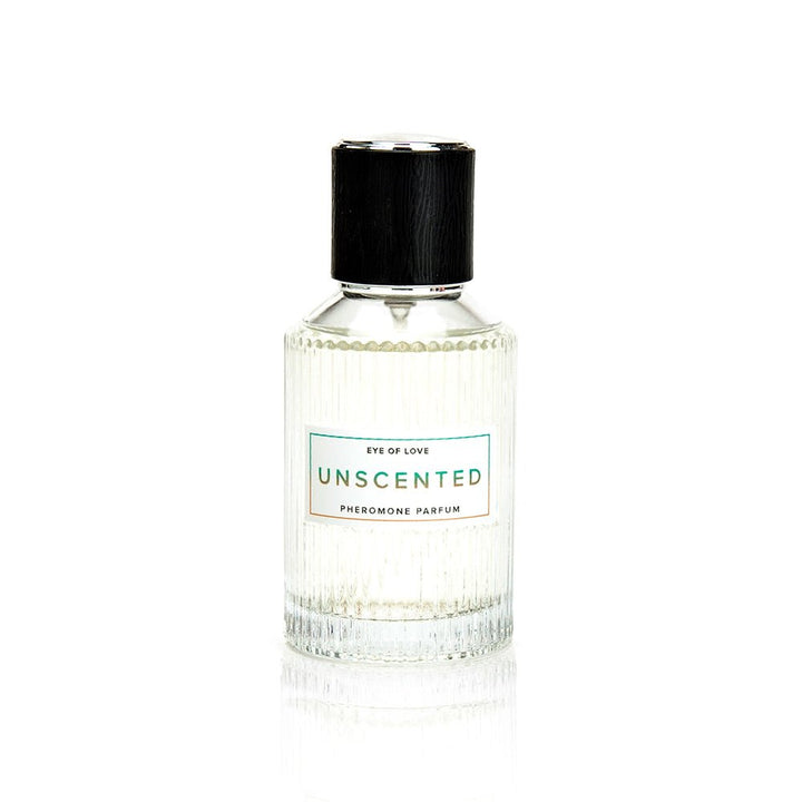 Clear ribbed glass bottle of Eye of Love Unscented Pheromone Parfum with black cap on white background.