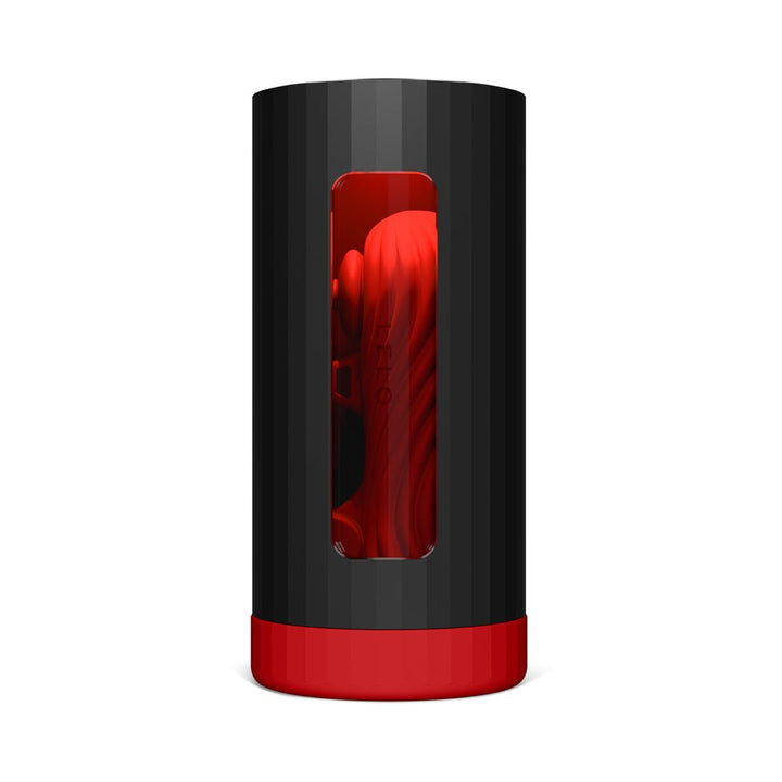 F1S V3 XL male pleasure device in black and red with visible textured silicone interior through front window.