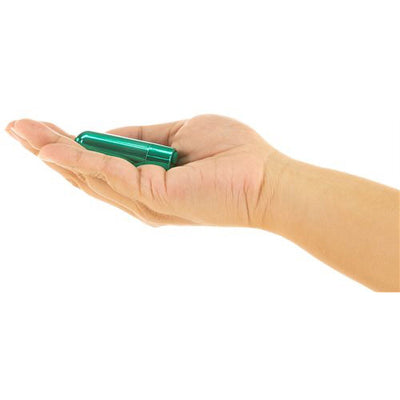 Hand holding a compact teal rechargeable bullet vibrator with a smooth, pointed design.
