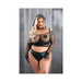 Plus size model wearing black fishnet long sleeve crop top, open cup bra with pasties, high-waist faux leather panties, gloves, choker, and bandana.