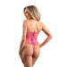 Woman wearing hot pink underbust corset with lurex detail and matching G-string, shown from the back on white background.