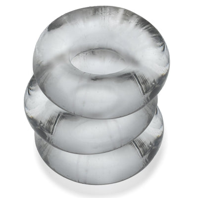 Three stacked translucent gray jumbo cockrings made of soft, stretchy Flextpr material.