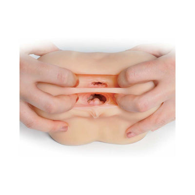 Hands stretching the dual-entry openings of a compact, realistic textured portable stroker toy.