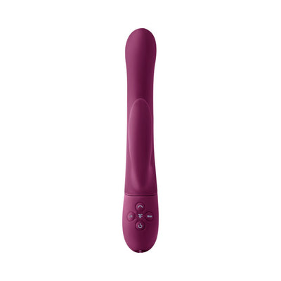 Sleek purple silicone rabbit vibrator with ergonomic design and control buttons on the base for adjustable settings.
