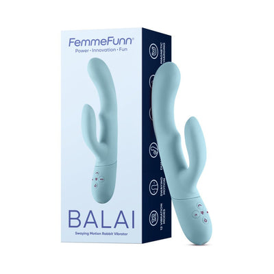 Light blue Femme Funn Balai rabbit vibrator with dual stimulating heads and control buttons, shown next to its packaging box.