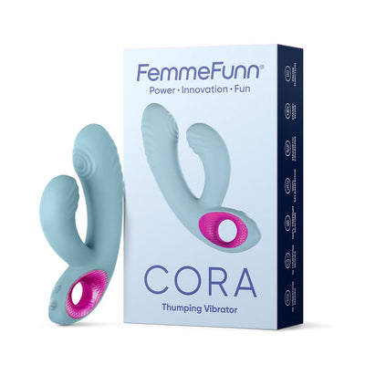 Femme Funn Cora Thumping Rabbit vibrator in blue silicone with ergonomic design and pink textured grip, displayed next to its packaging.