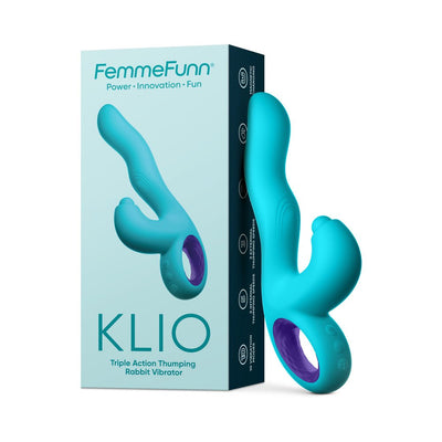 FemmeFunn Klio triple action rabbit vibrator in teal with ergonomic handle and purple accent, shown with packaging.