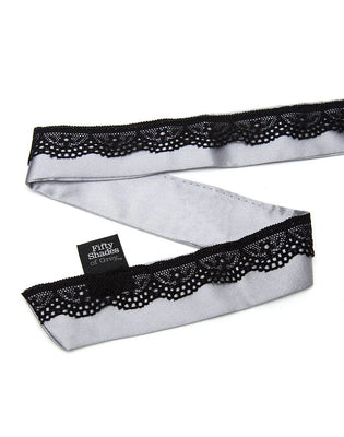 Grey satin collar with black lace trim from Fifty Shades of Grey Play Nice collection, laid flat on white background.