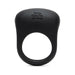 Black silicone vibrating love ring with textured pad and Fifty Shades of Grey logo embossed on top