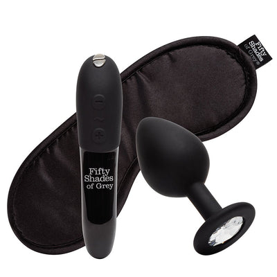 Fifty Shades of Grey black satin blindfold, sleek black vibrator, and silicone butt plug with crystal base kit.