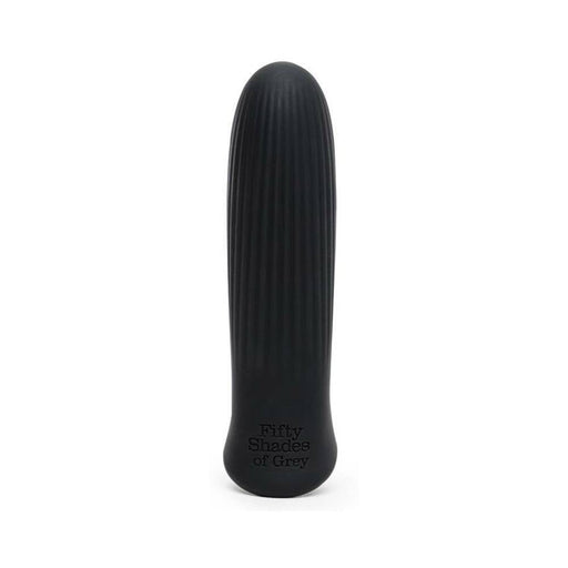 Black ribbed bullet vibrator with rounded tip and Fifty Shades of Grey logo on base, sleek silicone finish.